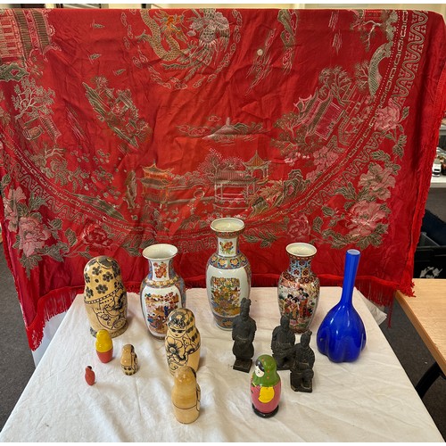 150 - Selection of oriental pottery includes Hand Painted vases, Russian dolls, Embroidered blanket etc