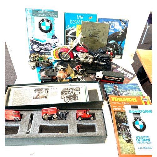 249 - Large selection of motorbike memorabilia includes Motorbike phone , figures, books etc