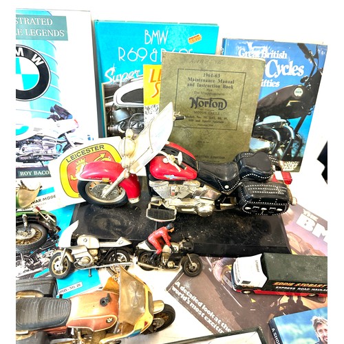 249 - Large selection of motorbike memorabilia includes Motorbike phone , figures, books etc