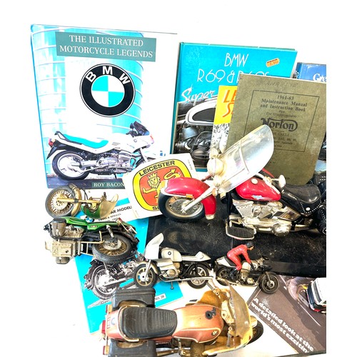 249 - Large selection of motorbike memorabilia includes Motorbike phone , figures, books etc