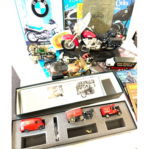 249 - Large selection of motorbike memorabilia includes Motorbike phone , figures, books etc