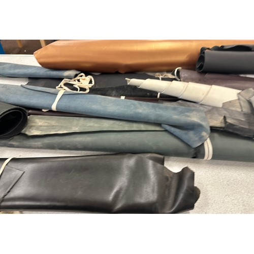 229 - Large selection of assorted leather cut offs largest measures approx 90 inches long 37 inches wide