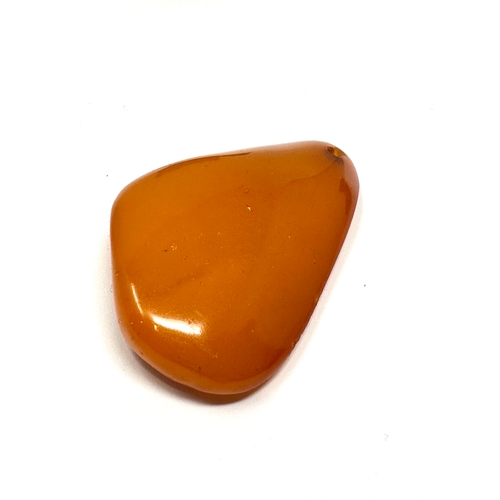 46 - Egg yolk baltic amber pendant measures approx 5.5cm drop by 3.2cm weight 11g