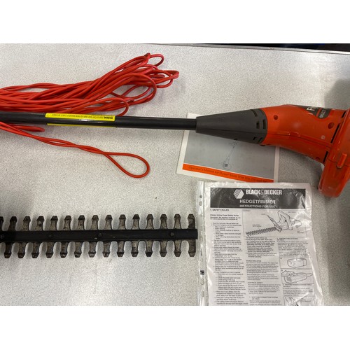 203 - Selection of outdoor equipment to include Black and decker hedge trimmer and a Flymo electric hedge ... 