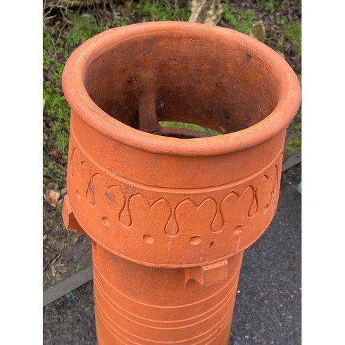 101V - Terracotta chimney pot measures approximatly 31 inches tall