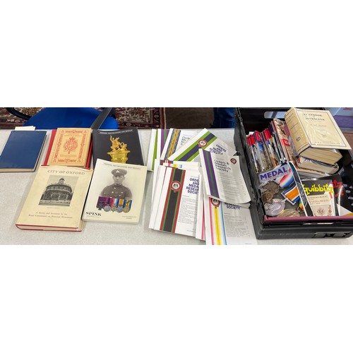 261 - Large selection of vintage medal books and magazines to include Coronation of her Majesty Queen Eliz... 