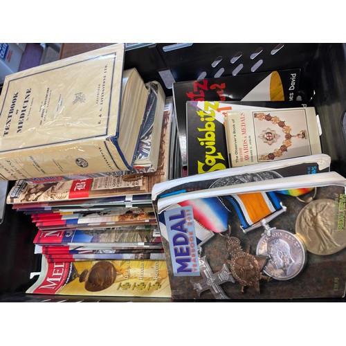 261 - Large selection of vintage medal books and magazines to include Coronation of her Majesty Queen Eliz... 