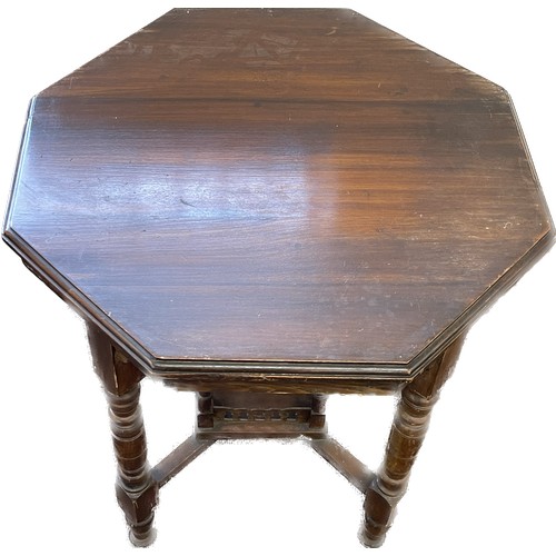 546 - Mahogany octagonal occasional table measures approx- 27.5 inches high by 23 inches wide and deep