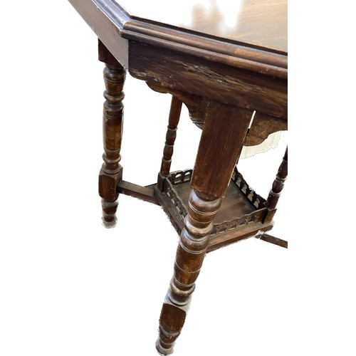 546 - Mahogany octagonal occasional table measures approx- 27.5 inches high by 23 inches wide and deep