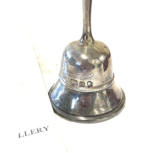 512 - Commemorative silver hallmarked bell. Weight approximate 114 grams, Overall height 4.5 inches