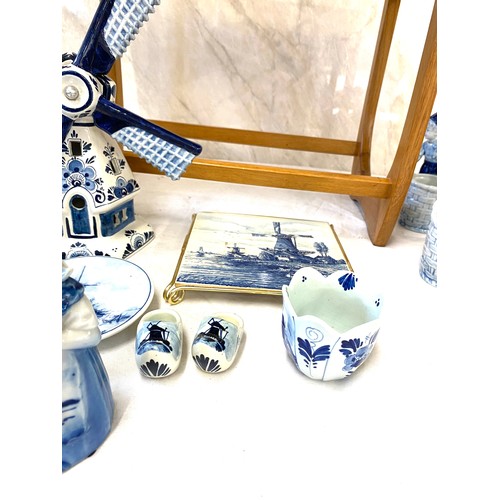 237 - Selection of blue and white pottery to include figurines and also a tile top table etc