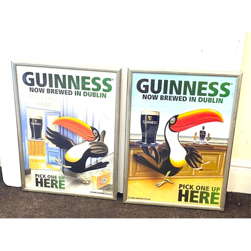 133 - Two framed  Guinness advertising posters '  Guinness now brewed in Dublin' measures approximately 24... 