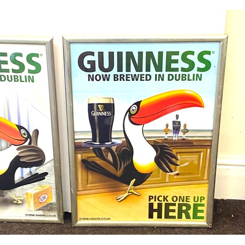 133 - Two framed  Guinness advertising posters '  Guinness now brewed in Dublin' measures approximately 24... 