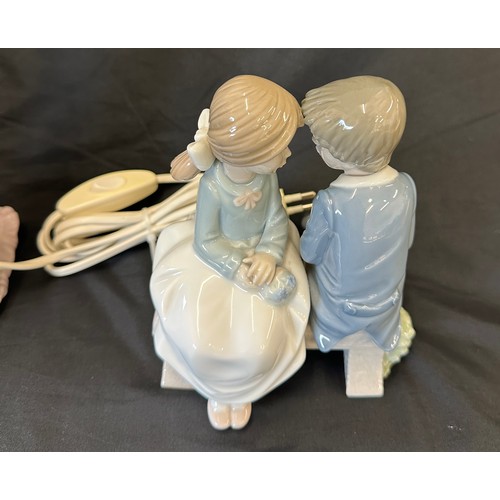 81 - Vintage Nao lamp and a Nao figure of a boy and girl sitting on a bench, height of the lamp approxima... 