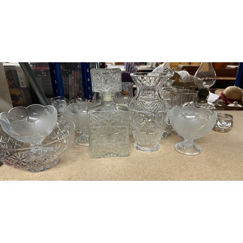 312 - Large selection of vintage and later glassware includes decanters, oil lamp, glasses etc