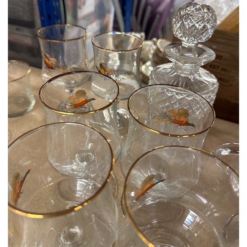 312 - Large selection of vintage and later glassware includes decanters, oil lamp, glasses etc