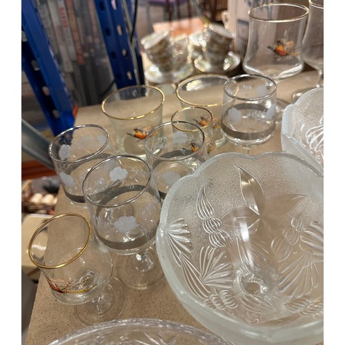 312 - Large selection of vintage and later glassware includes decanters, oil lamp, glasses etc