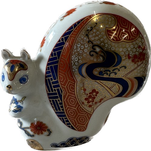 531 - Pair of Imari pattern squirrels, marked Japan to base