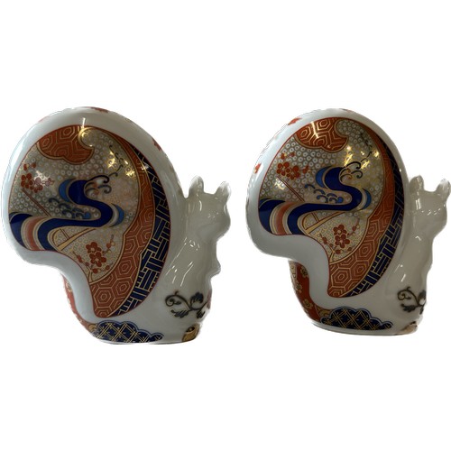 531 - Pair of Imari pattern squirrels, marked Japan to base