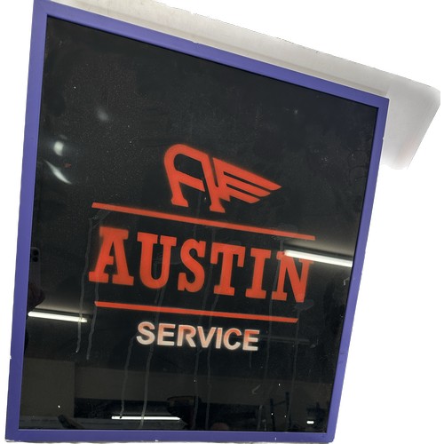 162 - Framed Austin Service sign measures approximately 27 inches tall 25 inches wide