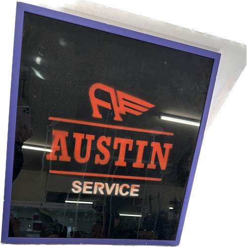 162 - Framed Austin Service sign measures approximately 27 inches tall 25 inches wide