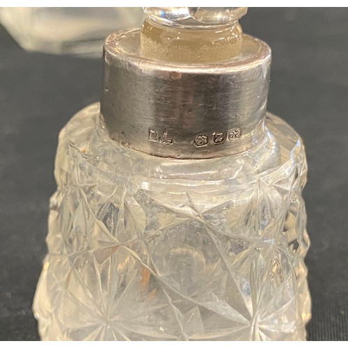 373 - 4 Silver topped scent bottles