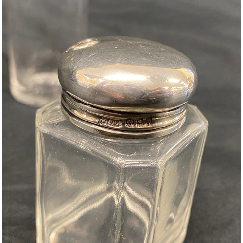 373 - 4 Silver topped scent bottles