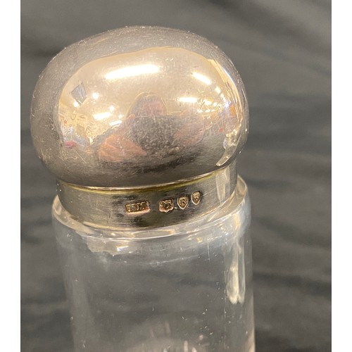 373 - 4 Silver topped scent bottles