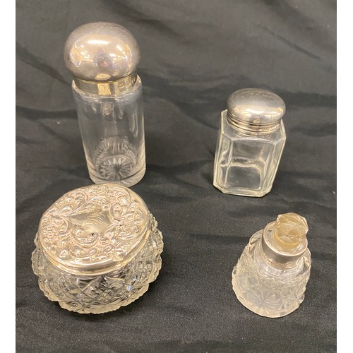 373 - 4 Silver topped scent bottles