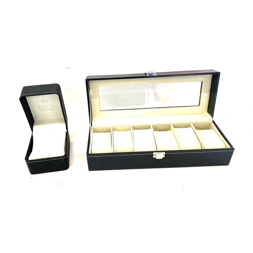 57 - New watch display box and 1 other