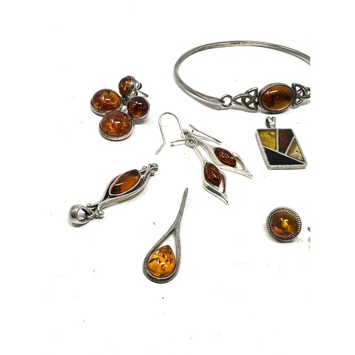 286 - 10 X .925 Amber Set Jewellery (39g)