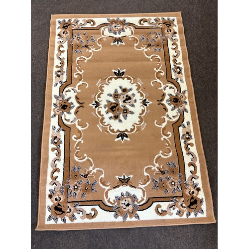 217 - Lounge rug measures approximately 57 inches long 39 inches wide