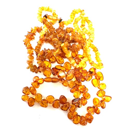 361 - Selection of amber cut necklaces, total weight 100grams