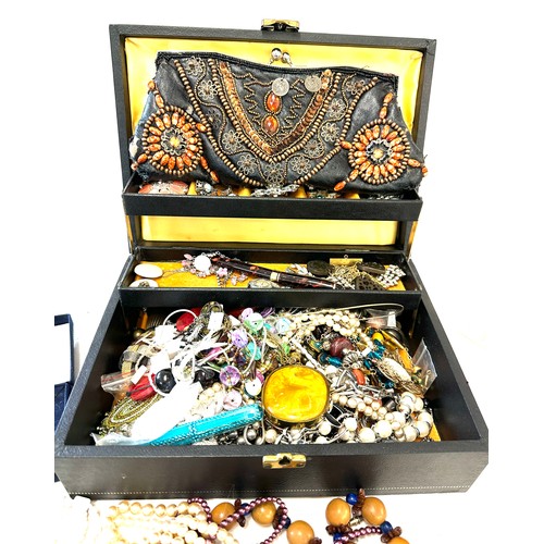 487 - Large selection of vintage and later costume jewellery in a jewellery box