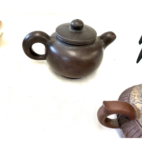32 - Selection of Chinese/ Oriental items includes chinese wine cup and a selection of tea pots, marks to... 