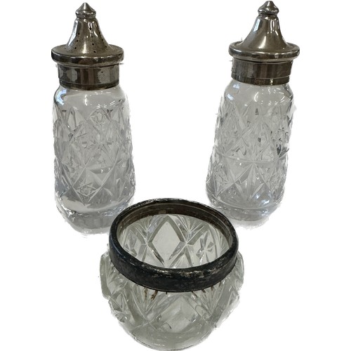 379 - Pair of silver lidded salt and pepper pot and a silver rimmed pot