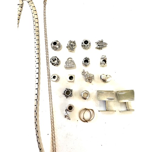 389 - Tray of costume jewellery includes charms silver chain and silver cufflinks