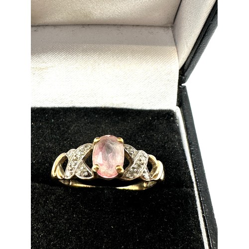 195 - 9ct gold pink topaz & diamond ring (2.4g)