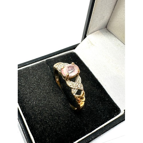 195 - 9ct gold pink topaz & diamond ring (2.4g)