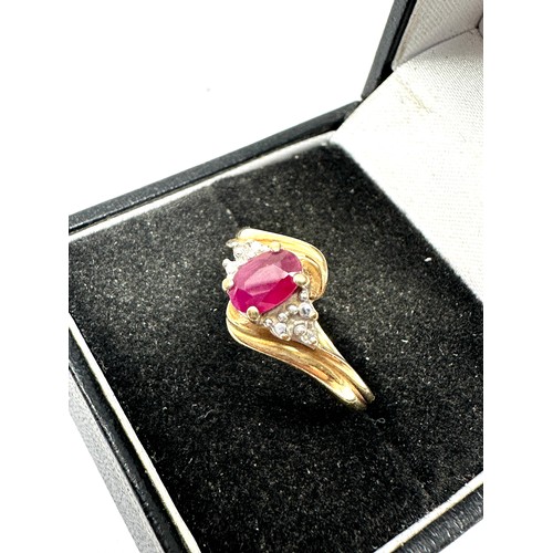 163 - 9ct gold diamond & ruby  ring (2.1g)