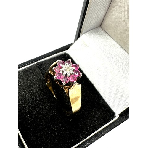 135 - 9ct gold diamond & ruby ring (3.5g)