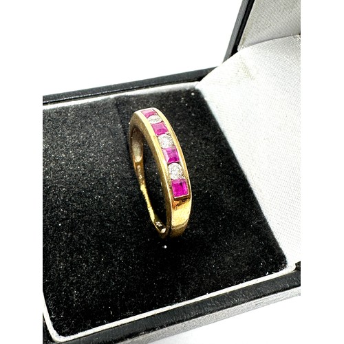 137 - 9ct gold diamond & ruby ring (2.3g)