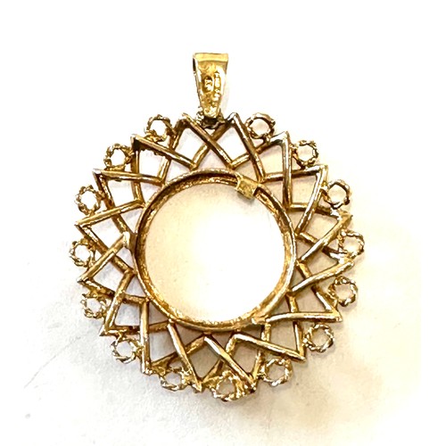 446 - 9ct gold sovereign mount pendant, hallmarked, total weight 8.6grams measures approximately 5cm by 4c... 