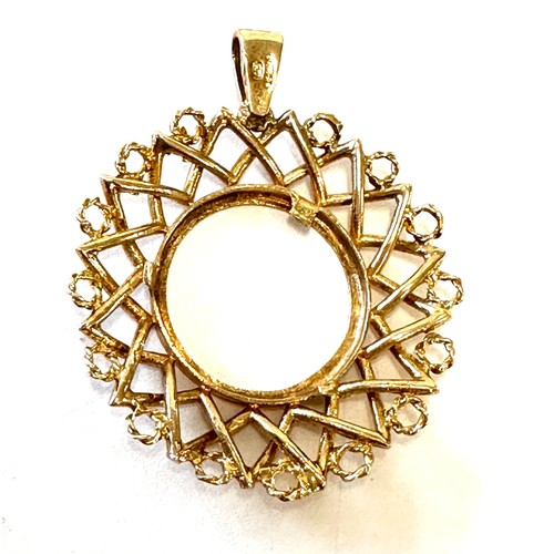 446 - 9ct gold sovereign mount pendant, hallmarked, total weight 8.6grams measures approximately 5cm by 4c... 