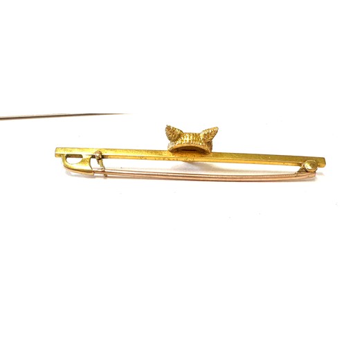 414 - 9ct Gold fox head bar brooch, weight approx 2.9 grams, hallmarked, 5.5cm long