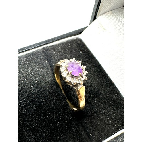 131 - 9ct gold diamond & amethyst ring (1.8g)