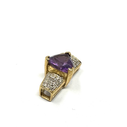 96 - 14ct gold diamond & amethyst pendant (2.2g)