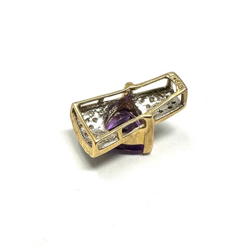 96 - 14ct gold diamond & amethyst pendant (2.2g)