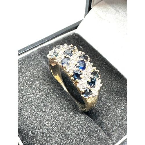 99 - 10ct gold diamond & sapphire dress ring (3.2g)