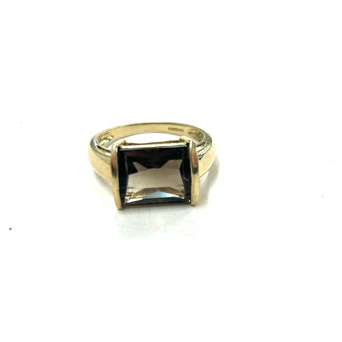 399 - Ladies 9ct gold smokey quartz dress ring, weight approximately 4.6 grams, ring size R